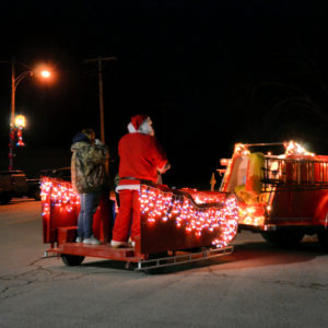 Santa on his way to deliver gifts around town